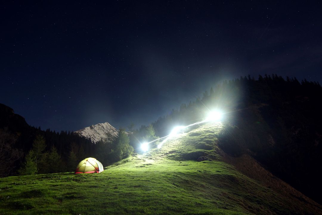 Nighttime Camping in Mountain Range under Starry Sky - Free Images, Stock Photos and Pictures on Pikwizard.com