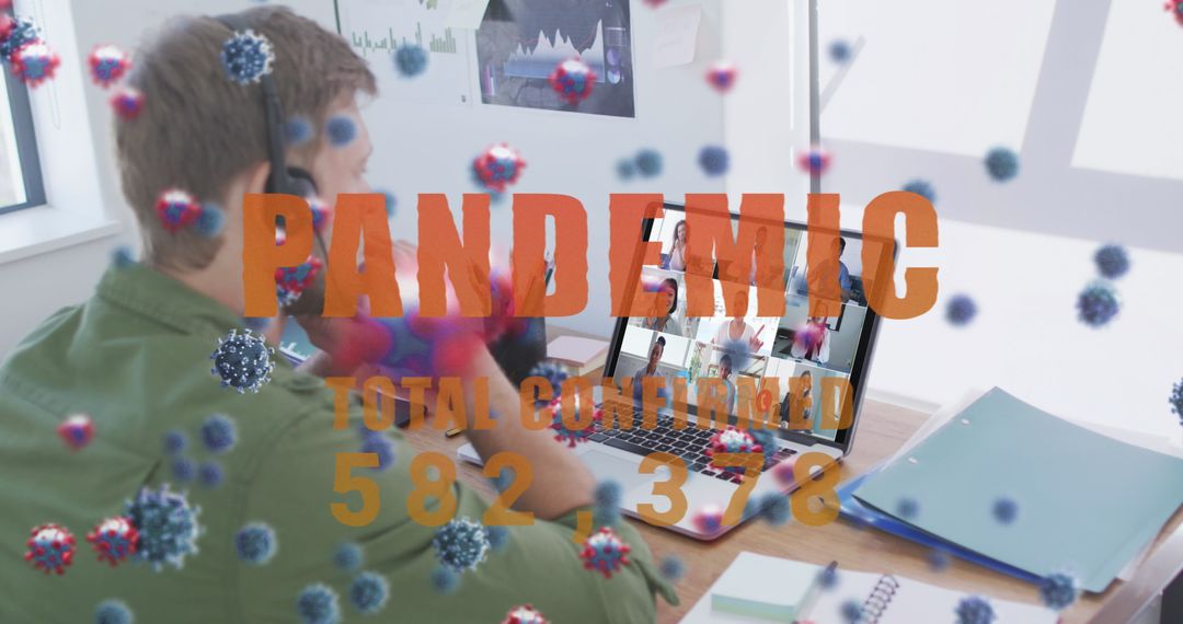 Man Video Calling Amid COVID-19 Pandemic with Floating Virus Visualization