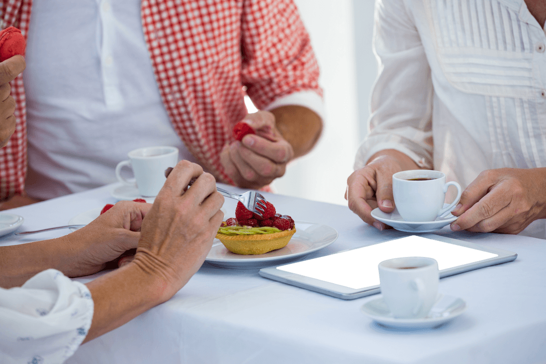 Transparent Scene of Colleagues Sharing Coffee and Desserts