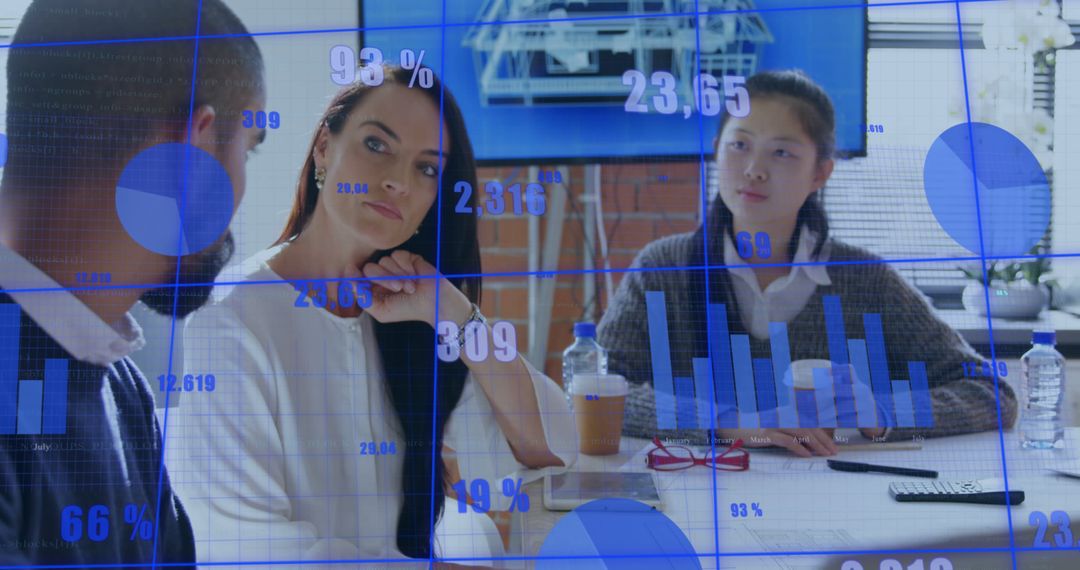 Diverse Colleagues Engaging in Data-Driven Business Strategy Meeting