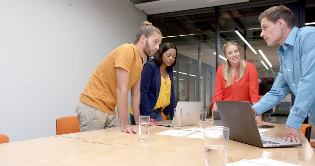 Diverse Professionals Engaged in Productive Office Meeting
