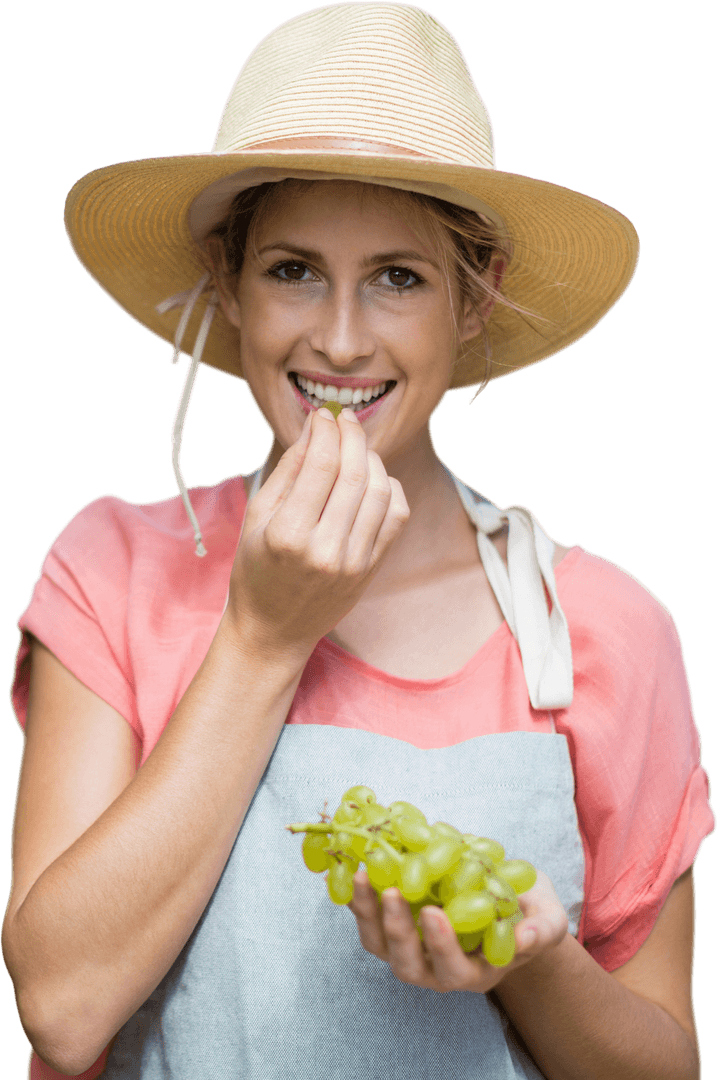 Smiling Woman in Hat Eating Grapes on Transparent Background