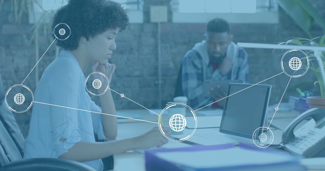 Diverse Colleagues in Office Using Digital Networking Technology Concept