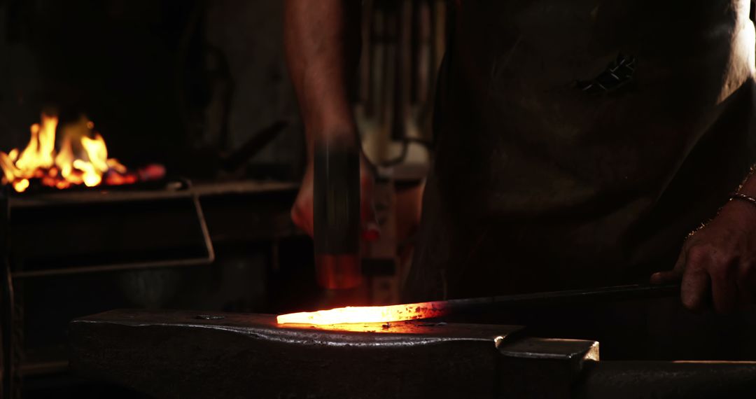 Traditional Blacksmith Forging Glowing Iron - Free Images, Stock Photos and Pictures on Pikwizard.com