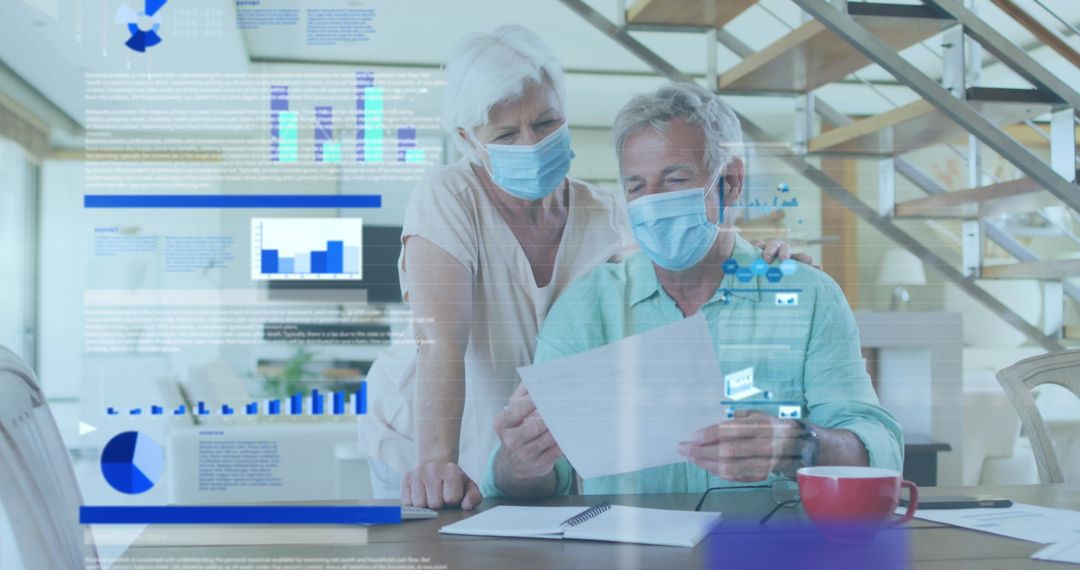 Senior Couple Analyzing Business Data while Staying Safe at Home