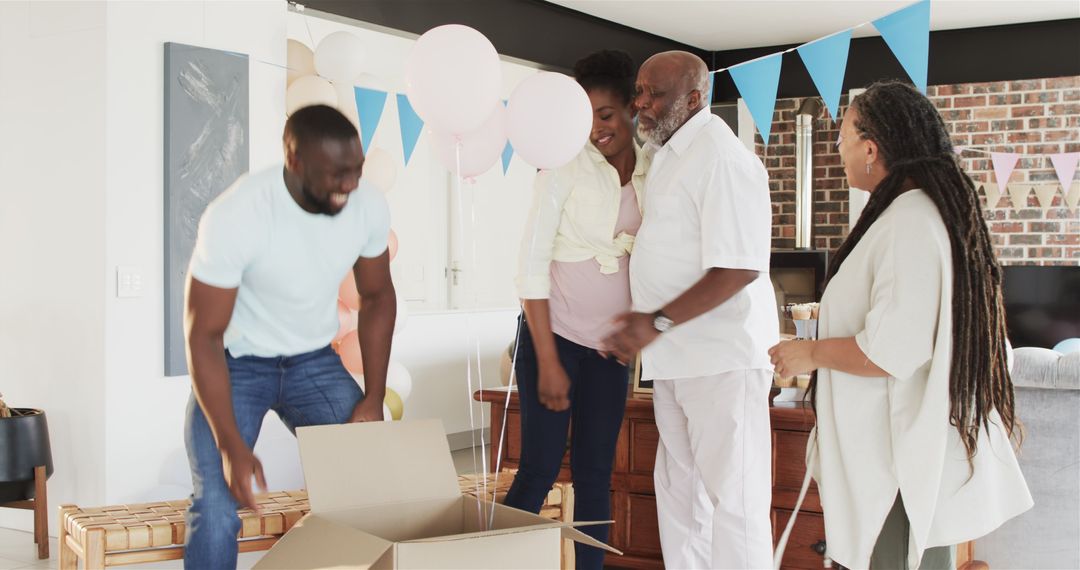 Multi-Generational Family Celebrating Baby Shower at Home