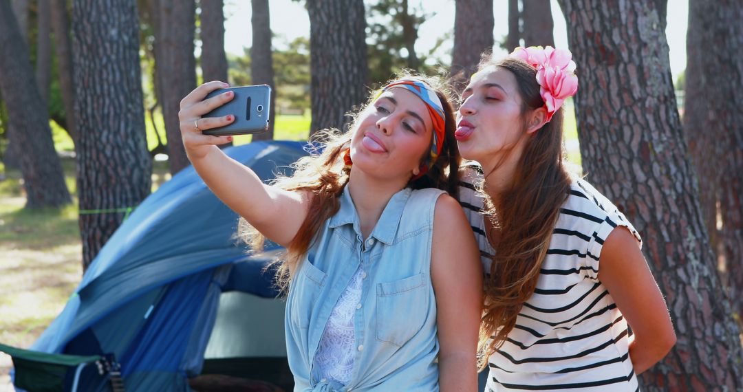 Friends Enjoying Outdoors Posing for Selfie at Camping Site - Free Images, Stock Photos and Pictures on Pikwizard.com