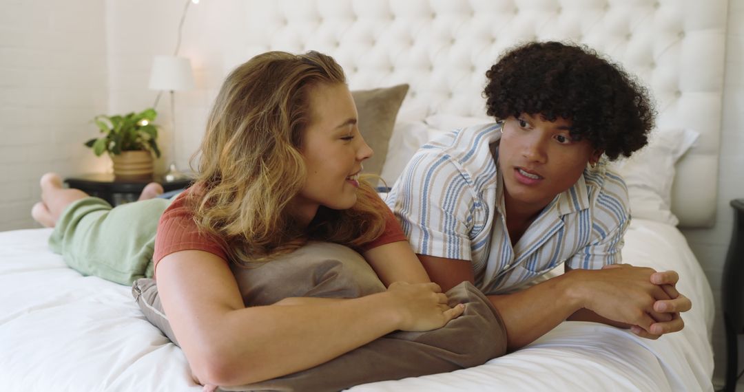 Couple Enjoying Intimate Conversation on Cozy Bed