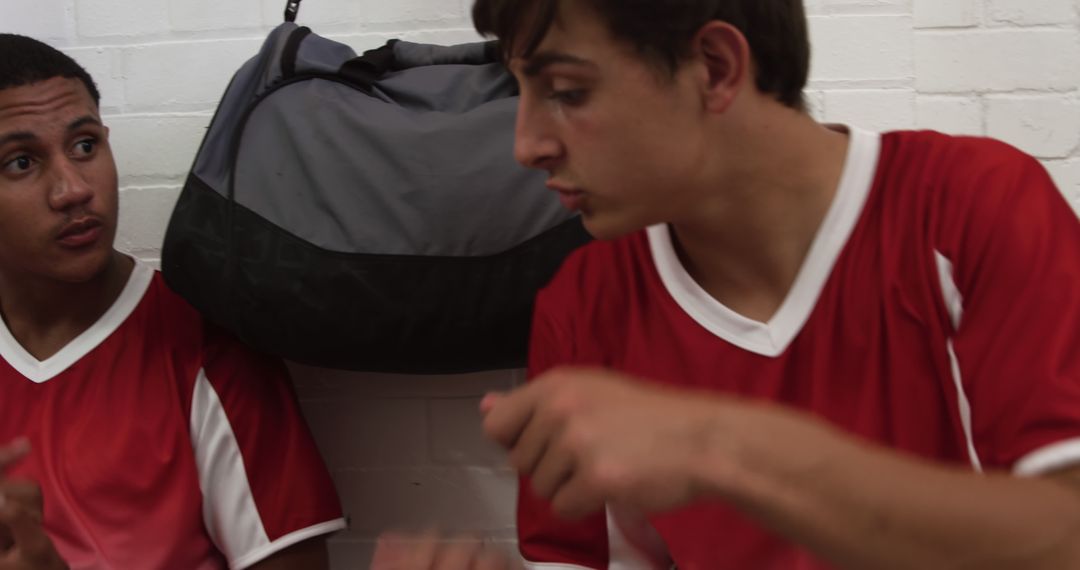 Soccer Teammates Chatting in Locker Room - Free Images, Stock Photos and Pictures on Pikwizard.com