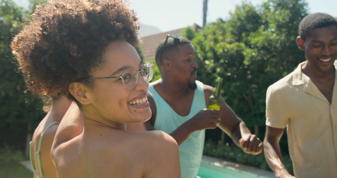 Diverse Friends Enjoy Sunny Poolside Gathering