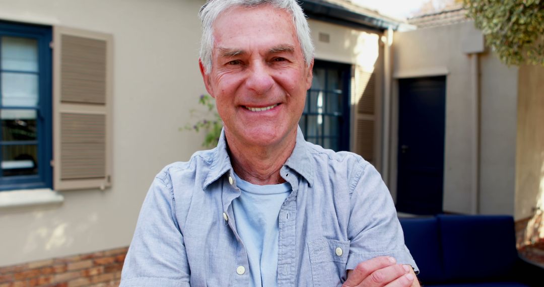 Senior Man Smiling Comfortably Outside Suburban Home - Free Images, Stock Photos and Pictures on Pikwizard.com