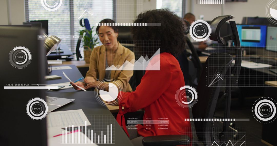 Multicultural Coworkers Analyzing Financial Data in Modern Office
