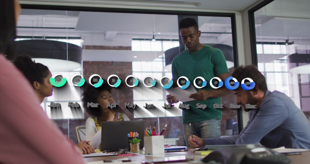 Diverse Team Discussing Data Analytics at Modern Workspace