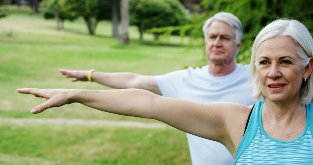 Senior Caucasian Couple Practicing Yoga Outdoors for Vitality - Free Images, Stock Photos and Pictures on Pikwizard.com