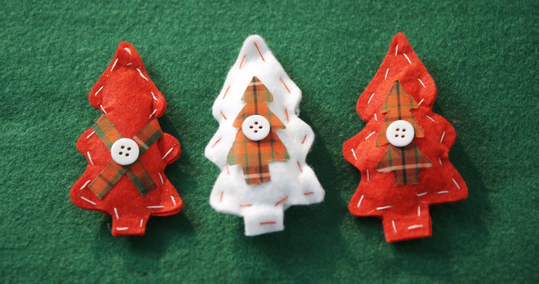 Handcrafted plaid-patterned Christmas ornaments with buttons enhance holiday cheer. - Free Images, Stock Photos and Pictures on Pikwizard.com