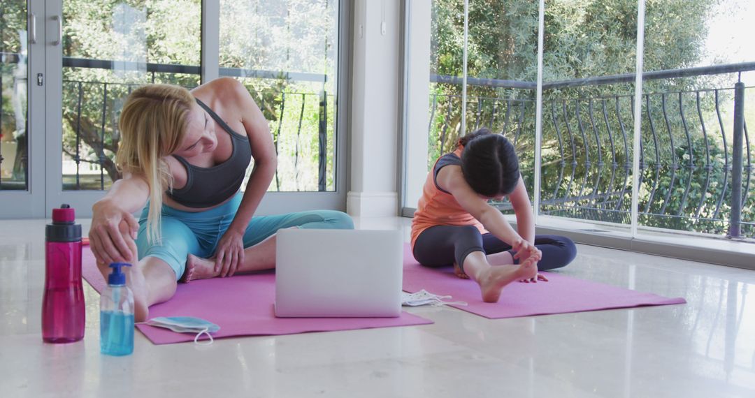 Mother and Daughter Doing Home Yoga Together on Mats - Free Images, Stock Photos and Pictures on Pikwizard.com