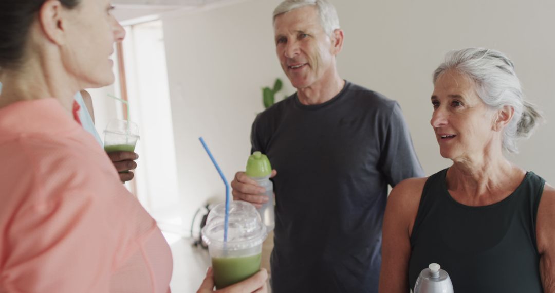 Active Senior Friends Drinking Green Smoothies Together After Exercise - Free Images, Stock Photos and Pictures on Pikwizard.com