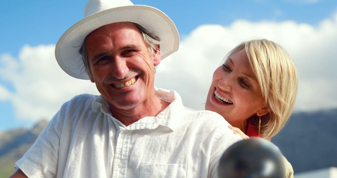 Couple Enjoying Outdoor Leisure with Scenic Mountain View - Free Images, Stock Photos and Pictures on Pikwizard.com