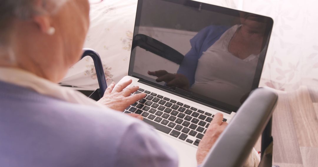 Elderly Woman Using Laptop at Home - Free Images, Stock Photos and Pictures on Pikwizard.com