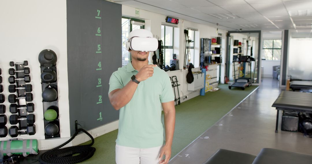 Man Engaging in Virtual Therapy with VR Headset in Rehab Center