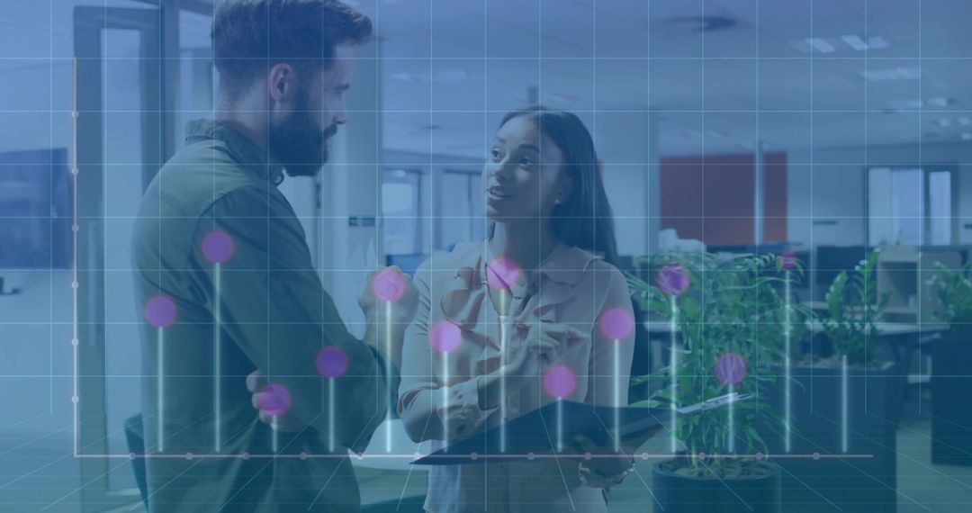 Colleagues Analyzing Data Using Tablet and Stylus with Graph Overlay in Office