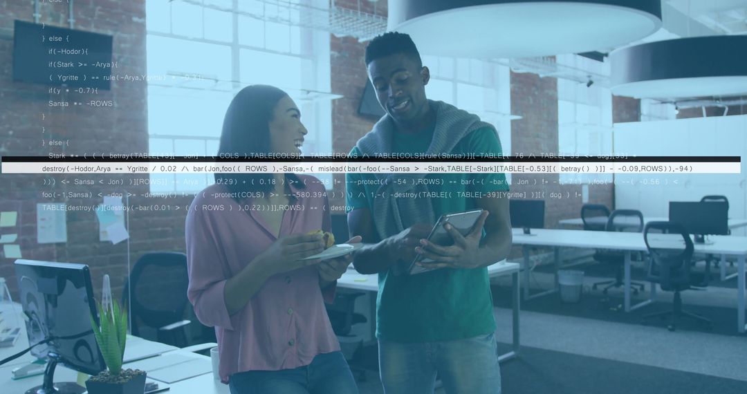 Coworkers Discussing Project in Modern Open Office