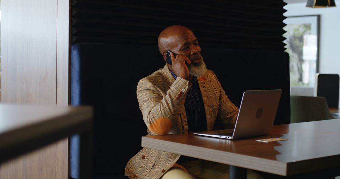 Senior African American Business Man Talking on Phone in Modern Office - Free Images, Stock Photos and Pictures on Pikwizard.com