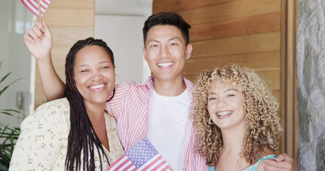 Diverse Group Celebrating with American Flags at Home