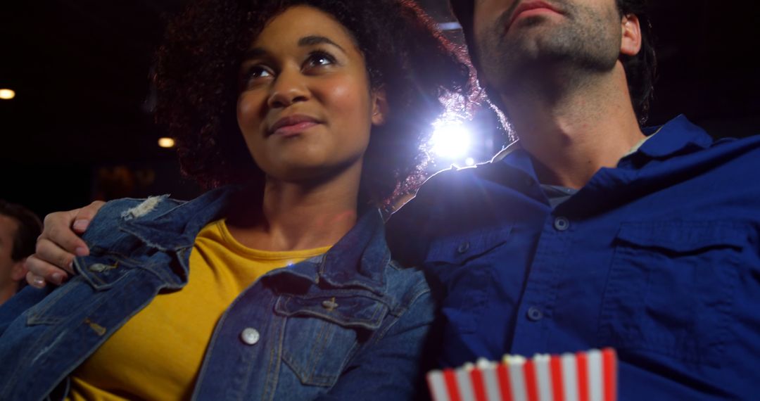 Couple Enjoying Movie Date Night in Theater