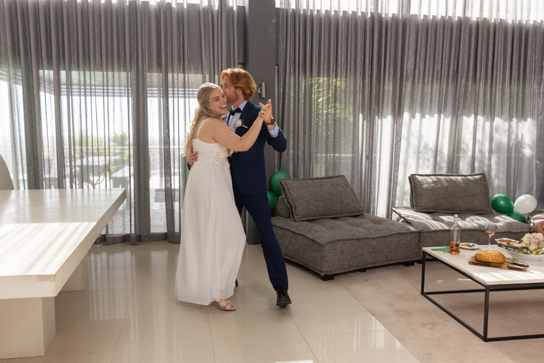 Bride and Groom Dancing in Elegant Modern Reception