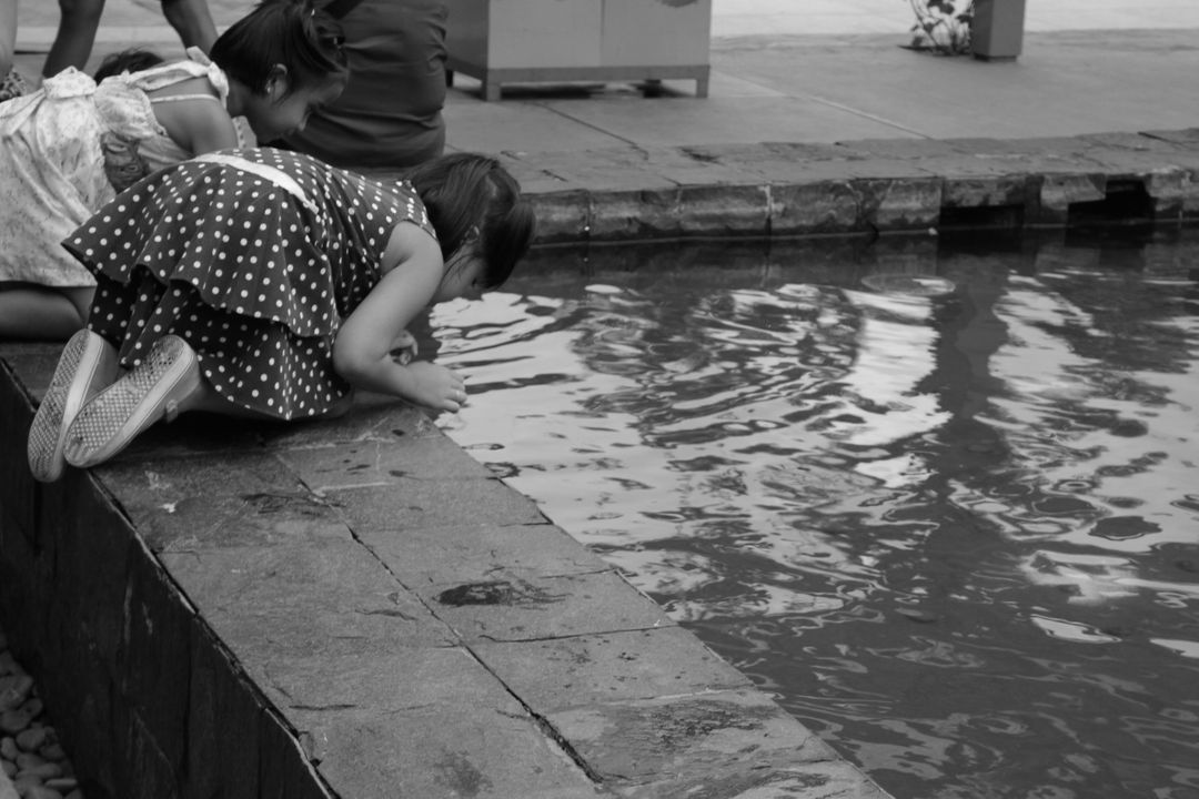 Children Playing by Water Outdoors Black and White - Free Images, Stock Photos and Pictures on Pikwizard.com