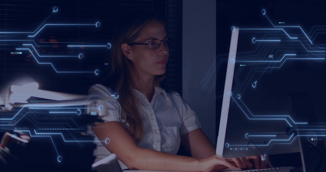 Businesswoman Analyzing Digital Circuit Technology on Computer at Night
