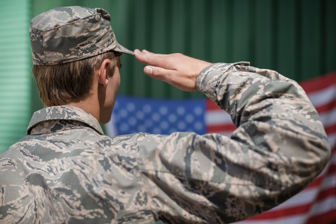 Military Soldier Saluting American Flag in Boot Camp - Free Images, Stock Photos and Pictures on Pikwizard.com