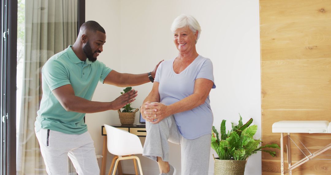 Physical Therapist Assisting Senior Woman with Exercise - Free Images, Stock Photos and Pictures on Pikwizard.com