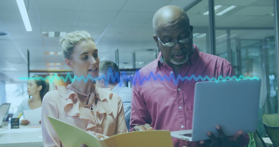 Multigenerational Team Collaborating in Modern Office Environment