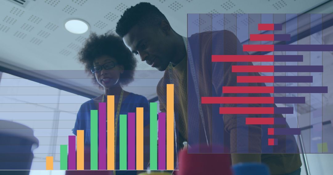 Diverse Professionals Analyzing Financial Graphs in Modern Office