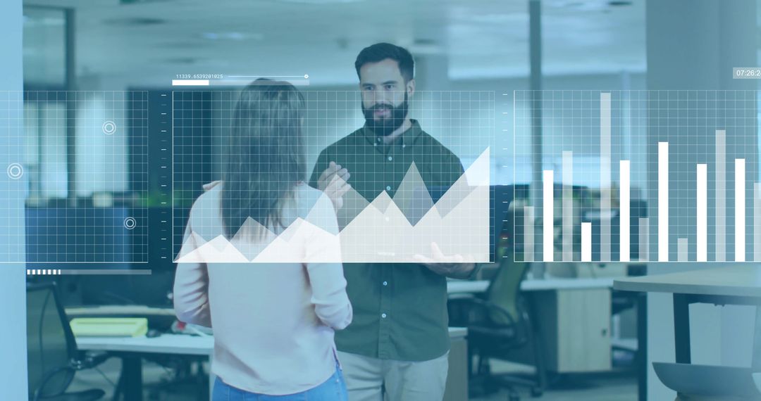 Coworkers Discussing Business Data in Modern Office with Digital Charts