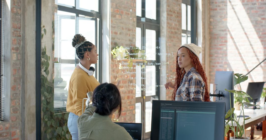Diverse Team Collaborating in Modern Loft Space