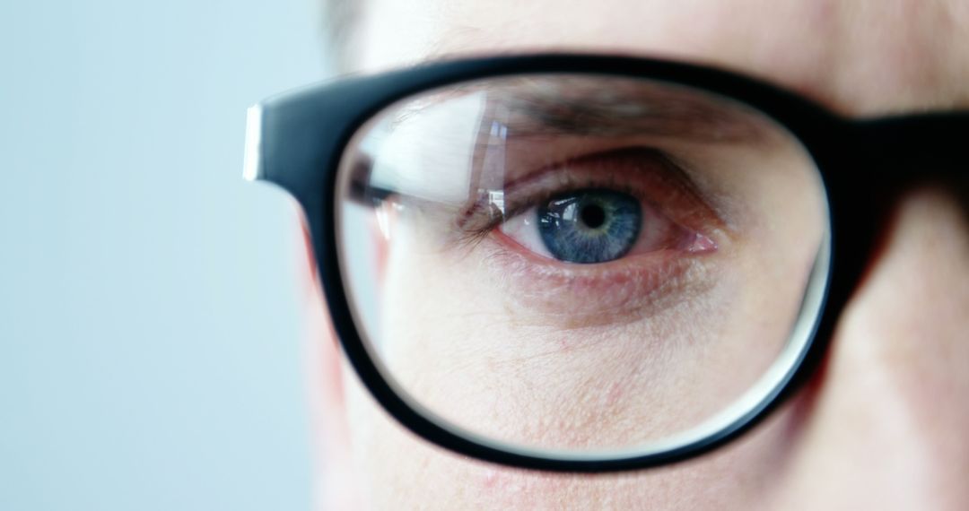 Close-up of Person Wearing Black Frame Glasses - Free Images, Stock Photos and Pictures on Pikwizard.com