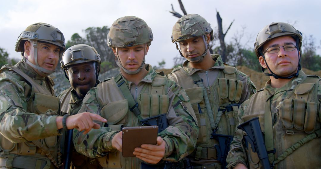 Front view of military soldiers using digital tablet during training - Free Images, Stock Photos and Pictures on Pikwizard.com