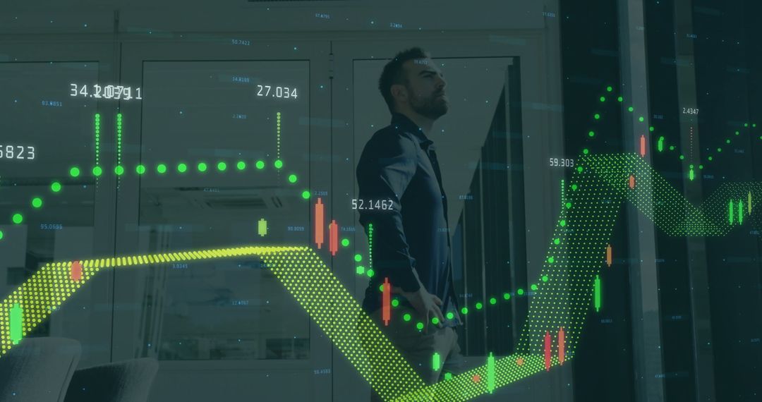Businessman Analyzing Financial Data with Graphs in Office