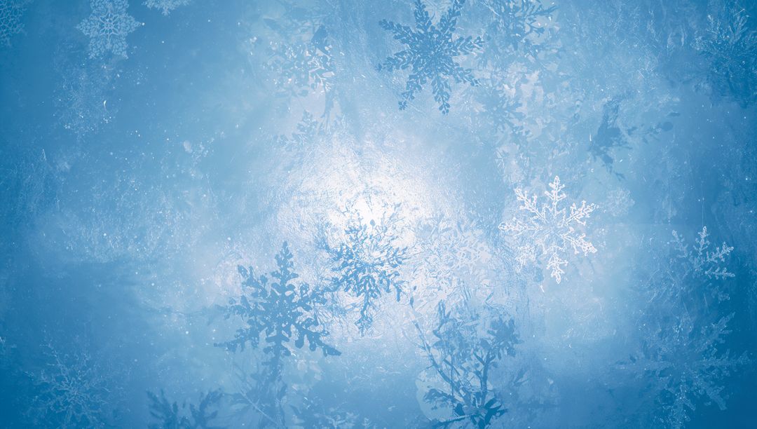 Glowing frosted glass with ornate snowflake cluster, icy halo and winter texture pattern