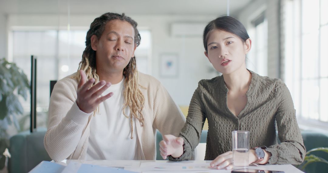 Diverse Colleagues on Video Call Collaborating in Modern Office