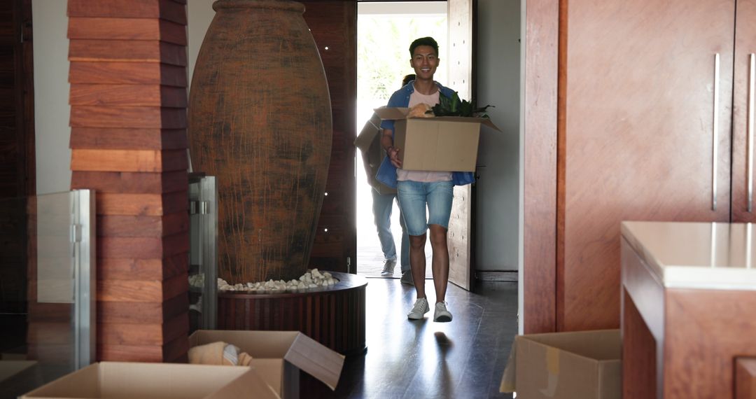 Joyful Couple Unpacking in Modern Home Setting