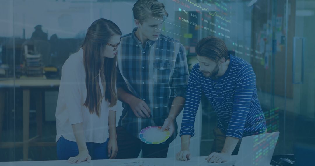 Creative Team Collaborating in Modern Office with Color Charts