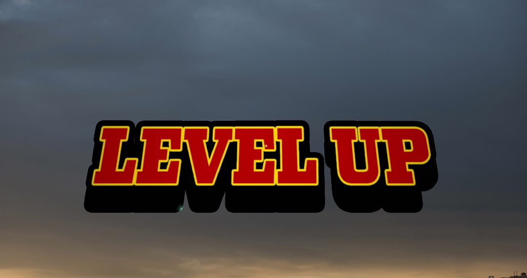 Level Up Text Overlay Against Dramatic Sunset Sky