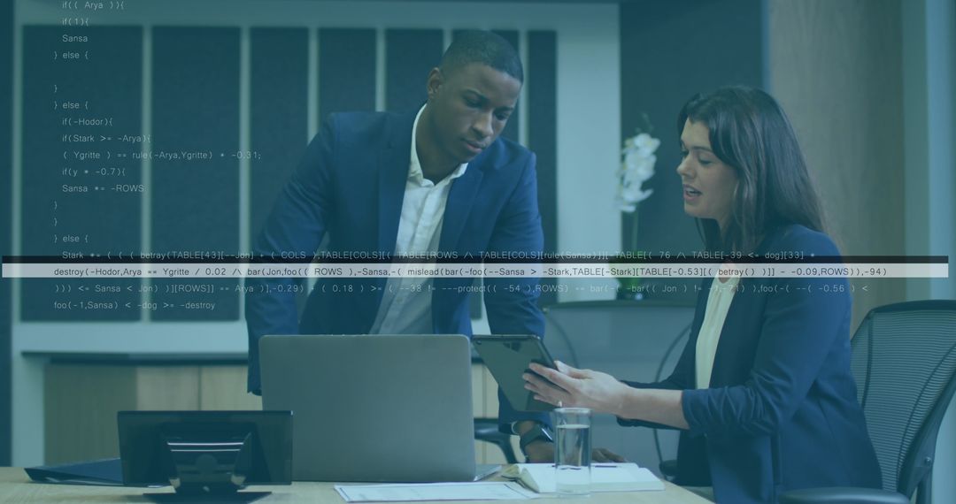 Business Colleagues Analyzing Financial Data on Digital Tablet