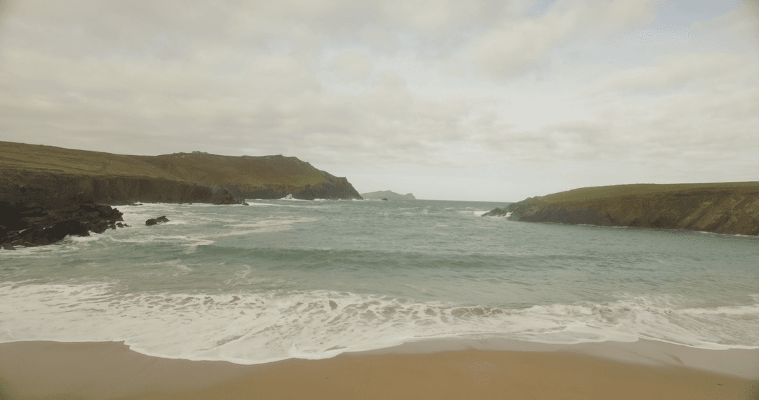 Transparent Ocean View on Overcast Day Along Rocky Coastline