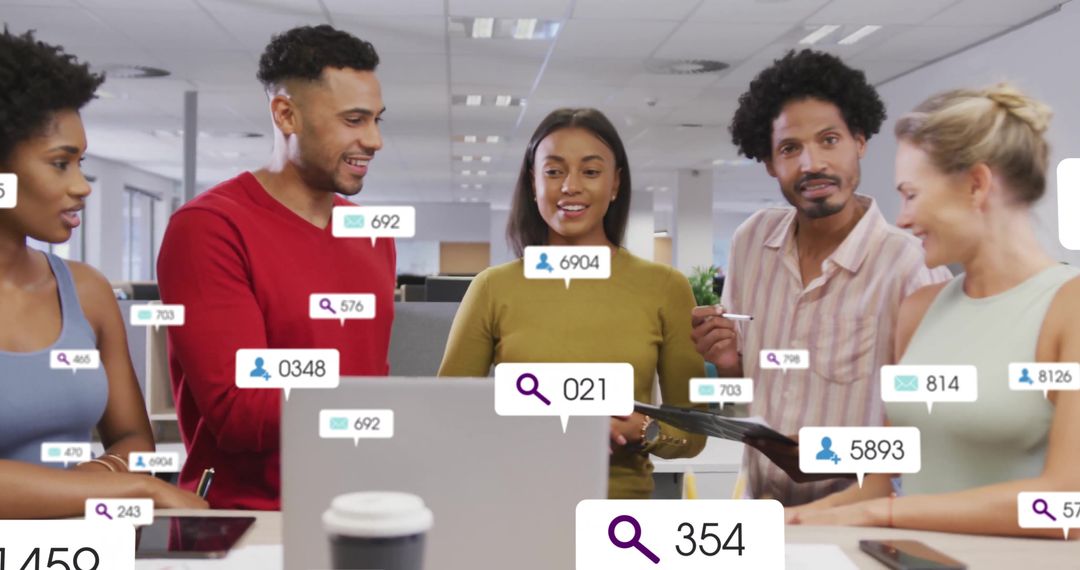 Diverse Team Collaborating with Digital Media Interfaces in Modern Office
