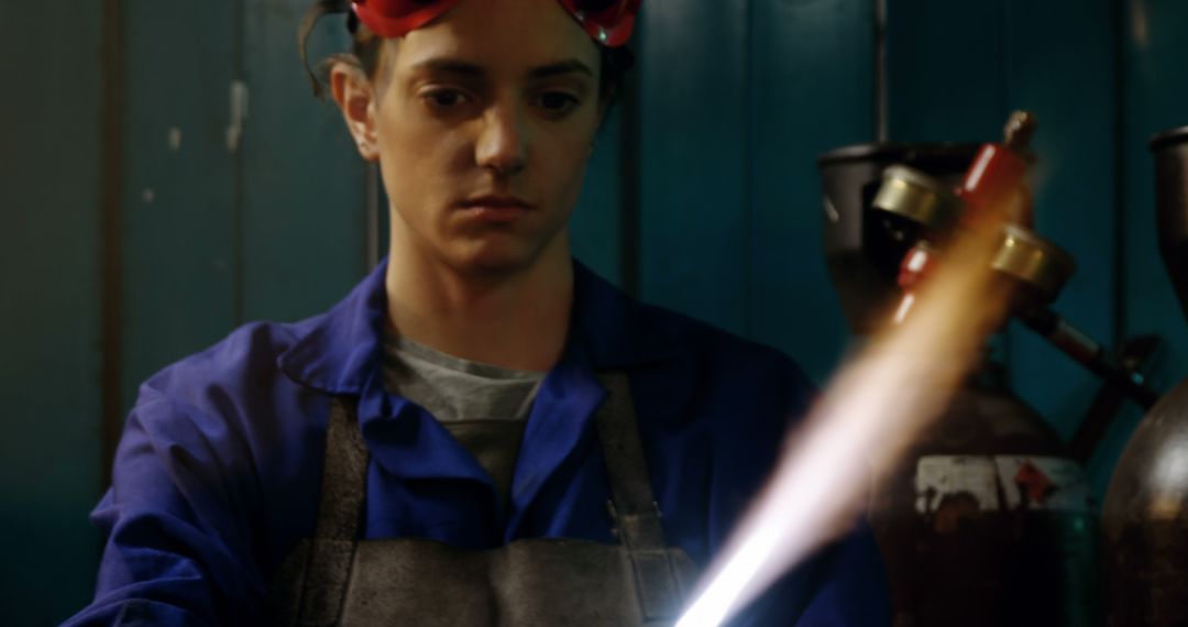 Young Welder in Protective Gear Working in Workshop - Free Images, Stock Photos and Pictures on Pikwizard.com